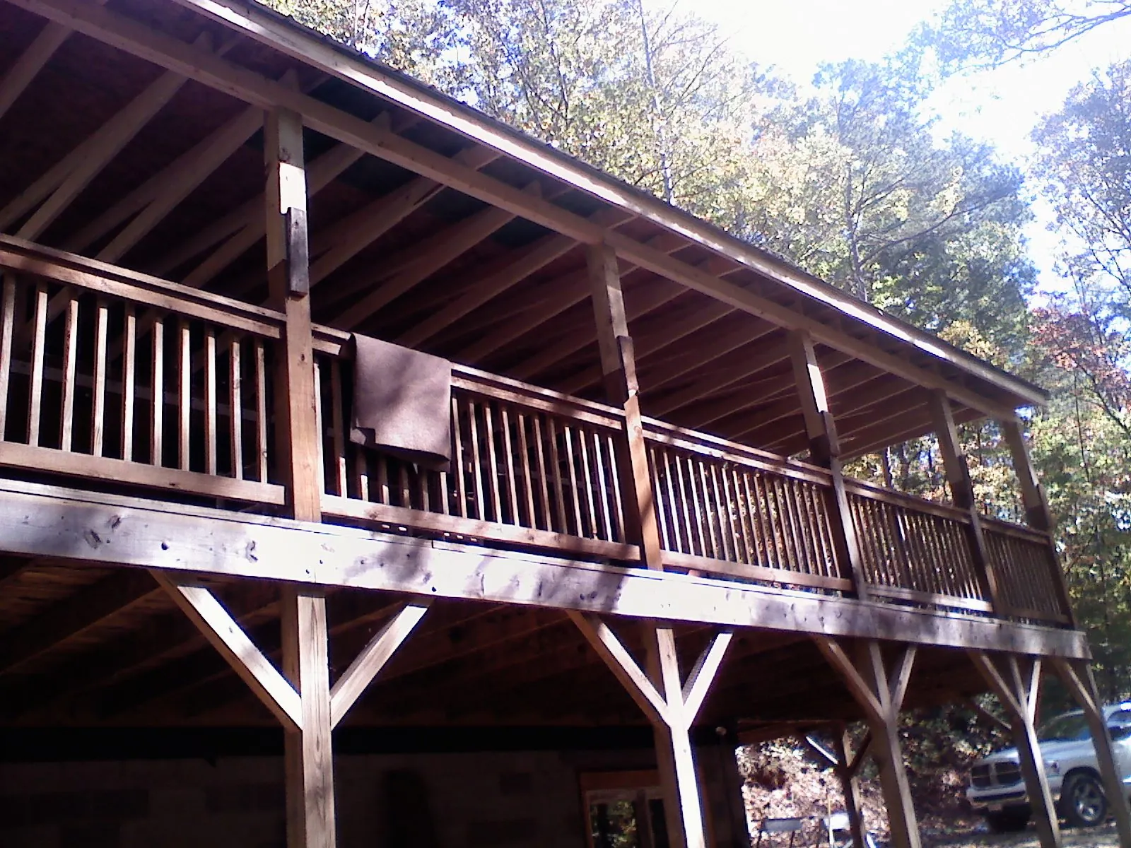 Timber framing under a new elevated porch and deck — Roof Leak Repair in Sandwich by Roofing Brothers